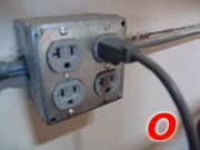 an electrical outlet with a cord plugged into it