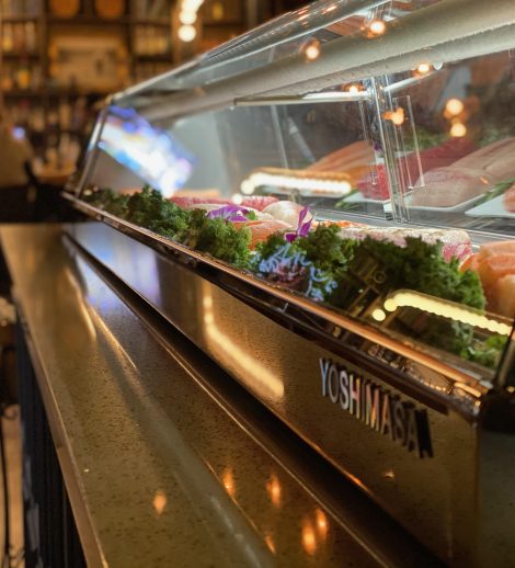 A glass display case at a restaurant called oyster society